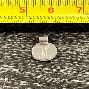 Sterling silver 925 pendant with engraved initial M.